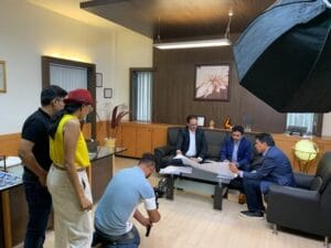 Business meeting filmed in modern office setting